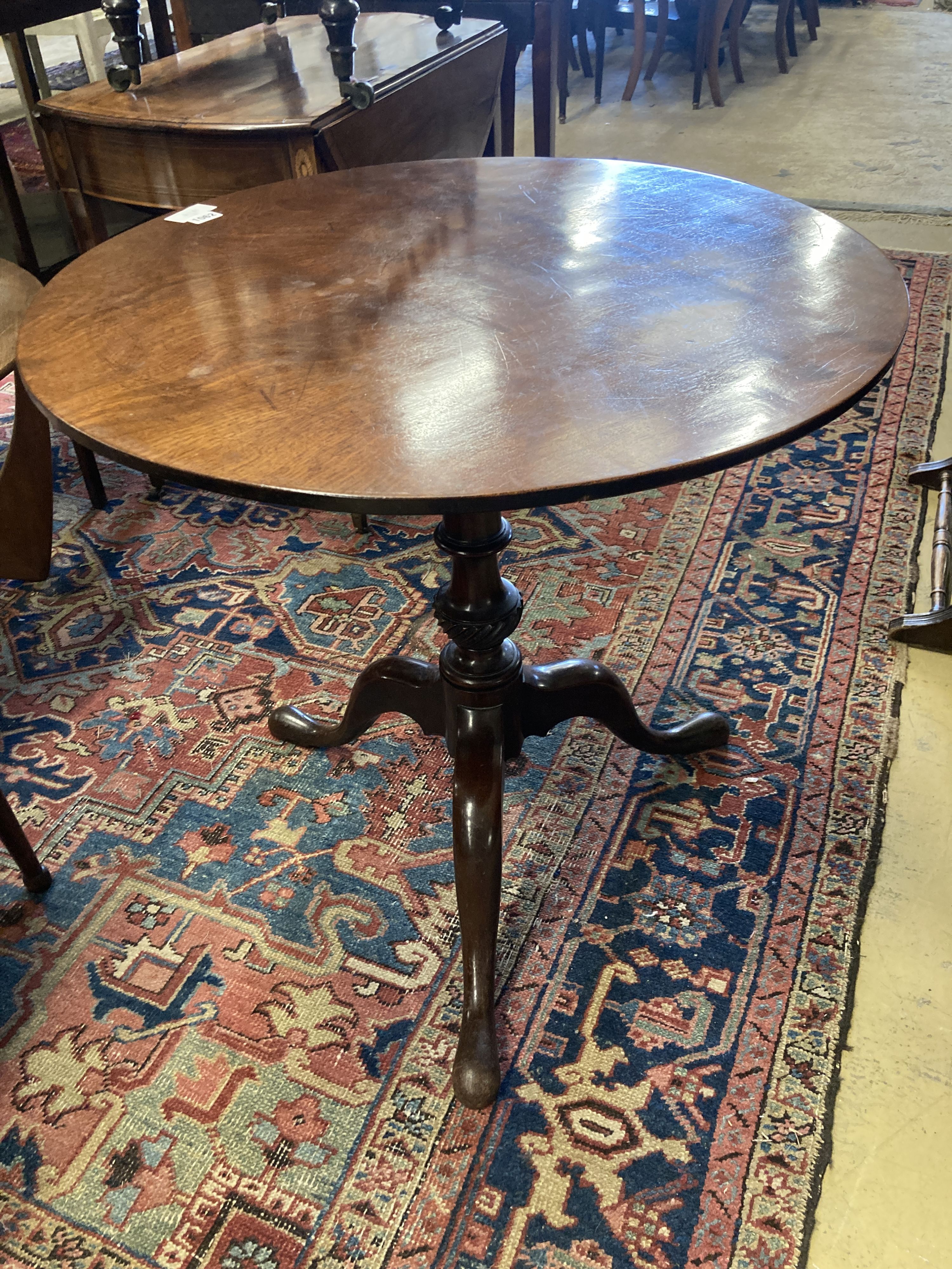 A George III and later circular tilt top tea table, diameter 70cm, height 68cm